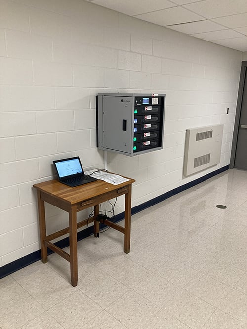 LocknCharge FUYL Tower 5 Smart Charging Locker wall mounted in a hallway at Mondovi Schools
